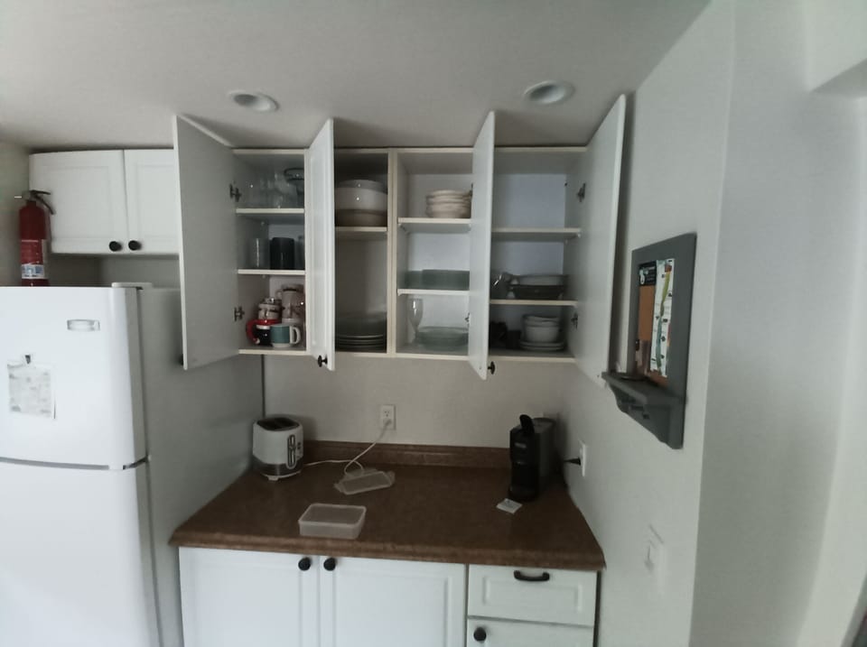 full set of dishware, espresso and kcup maker, toaster, full glassware