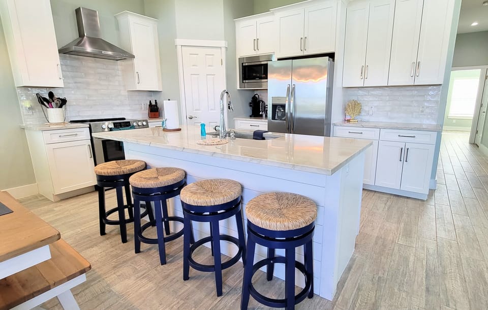 The modern kitchen is fully-equipped.