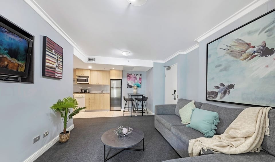 the living space and the open kitchen area.