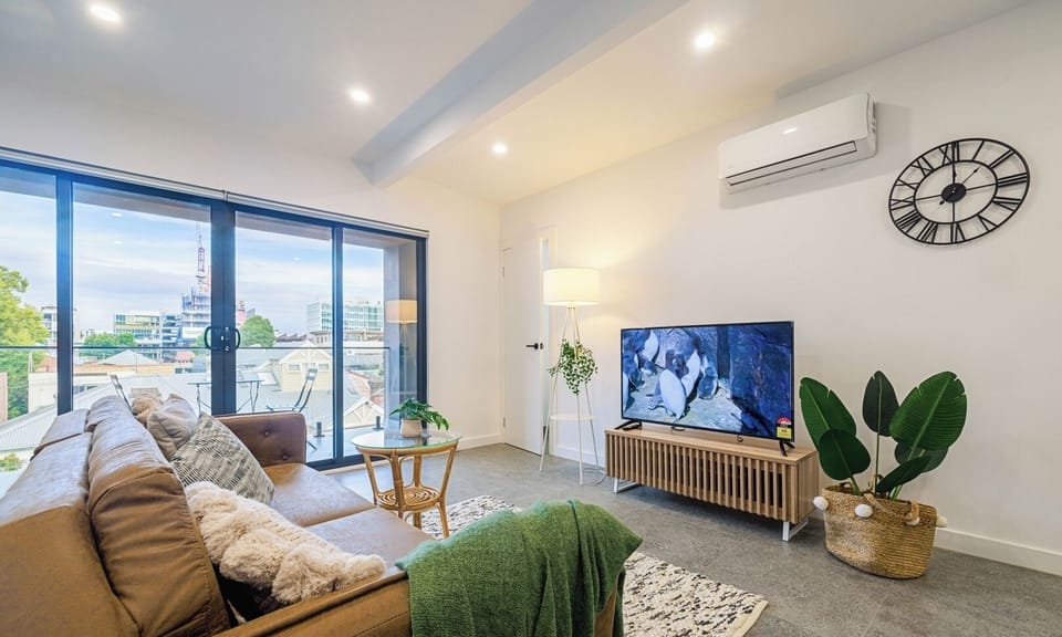Comfortable sofa and TV