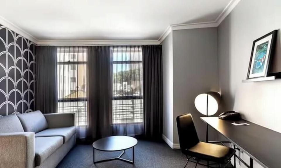 Spacious living area with a sofa bed and warm homey feel