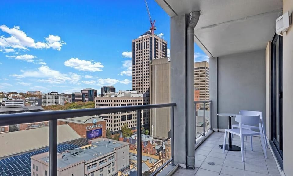 A long balcony space with high railings