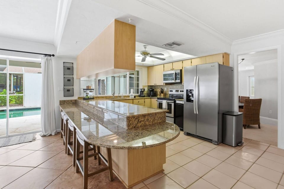 Enjoy ample prep space and seating.