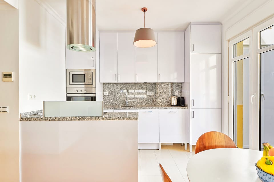 Comfort Apartment | Private kitchen | Electric kettle, toaster, highchair