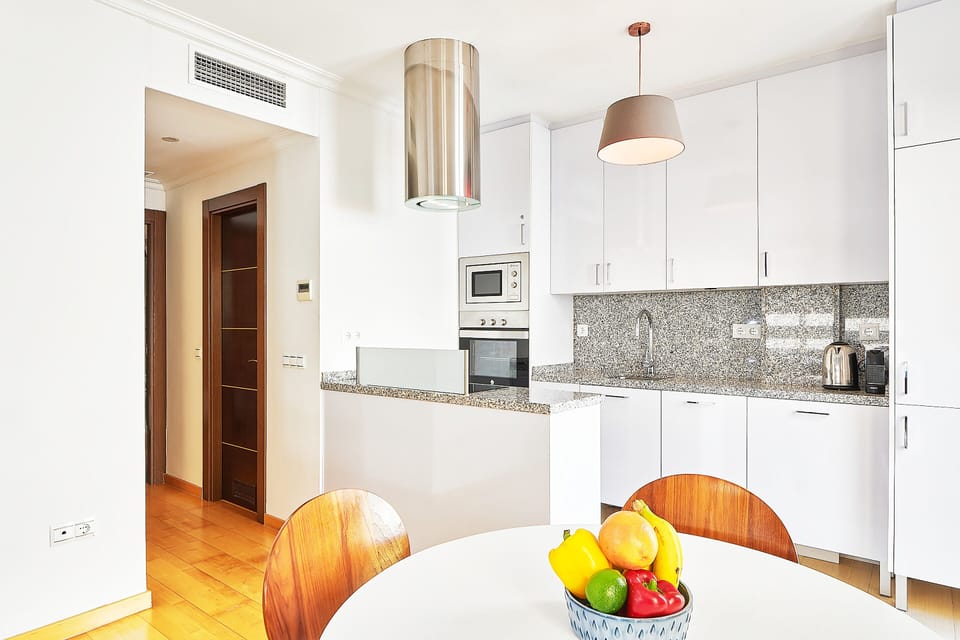 Comfort Apartment | Private kitchen | Electric kettle, toaster, highchair