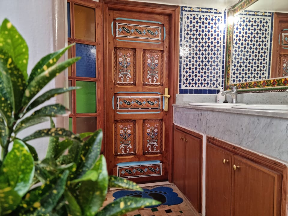 Shower, free toiletries, hair dryer, slippers
