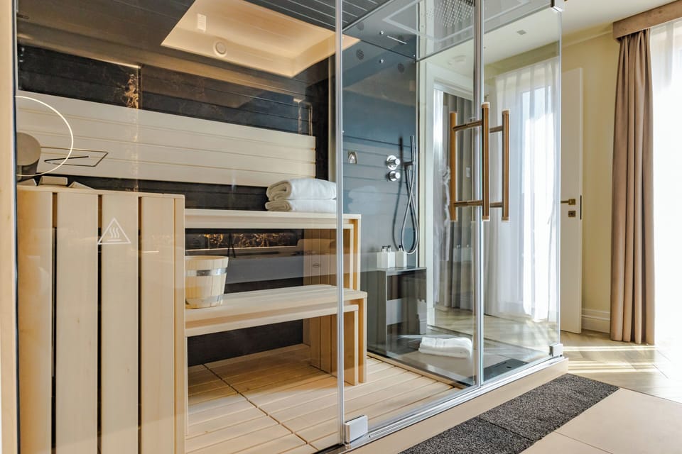 Presidential Suite, Sauna, City View | Minibar, in-room safe, desk, soundproofing
