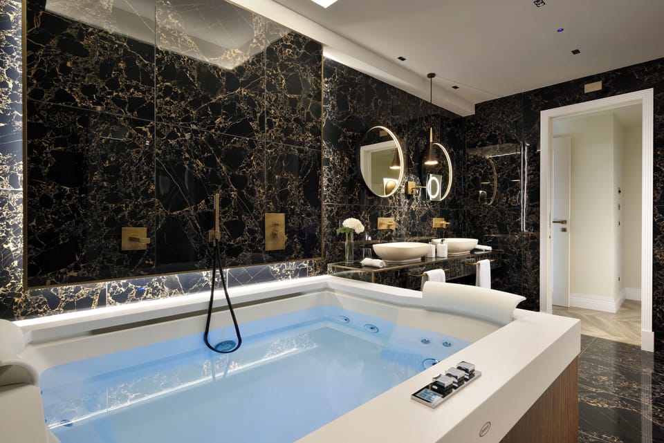 Presidential Suite, Sauna, City View | Bathroom | Rainfall showerhead, free toiletries, hair dryer, bidet