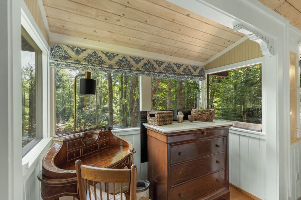 Antique writing desk available in the penthouse level king suite. 