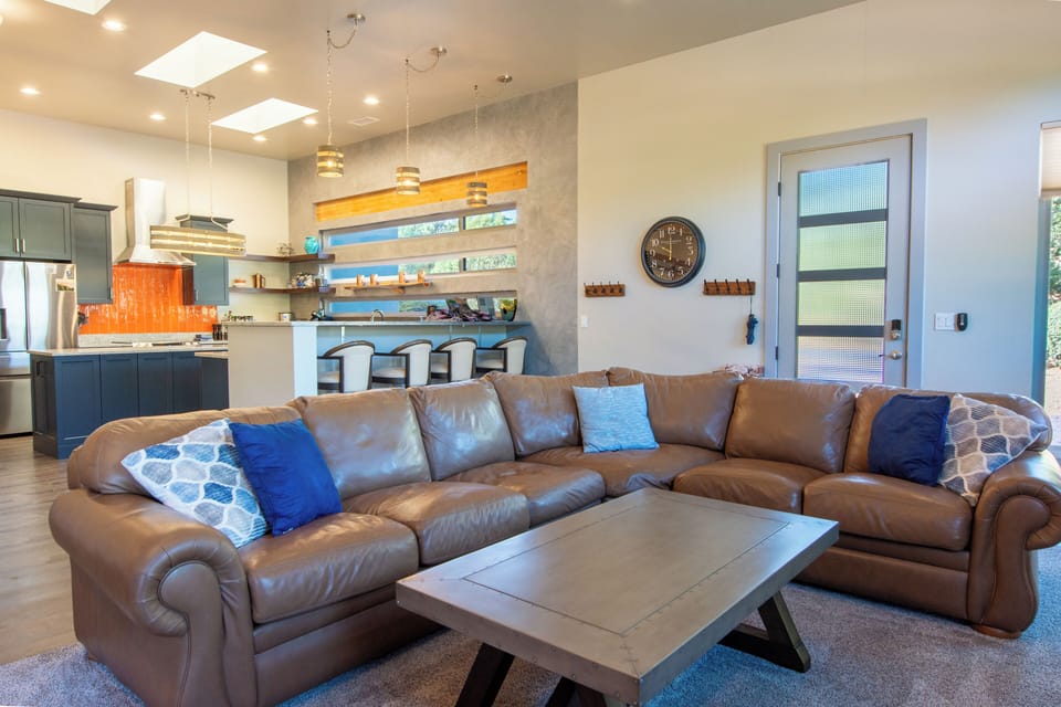 Large leather couch and breakfast bar