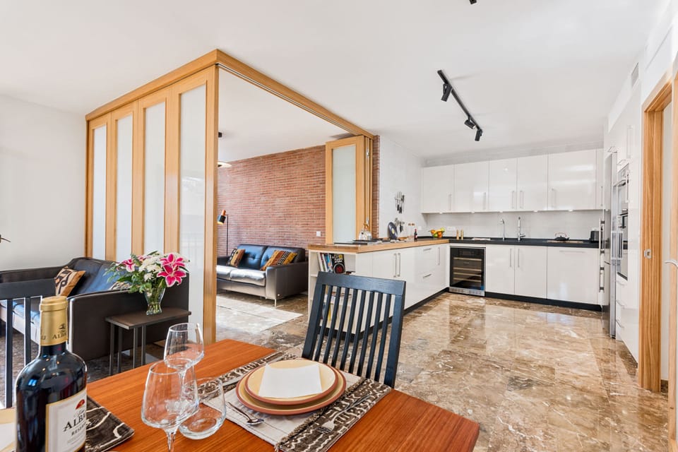 Comfort Apartment, City View | Living area | 50-inch LCD TV with cable channels