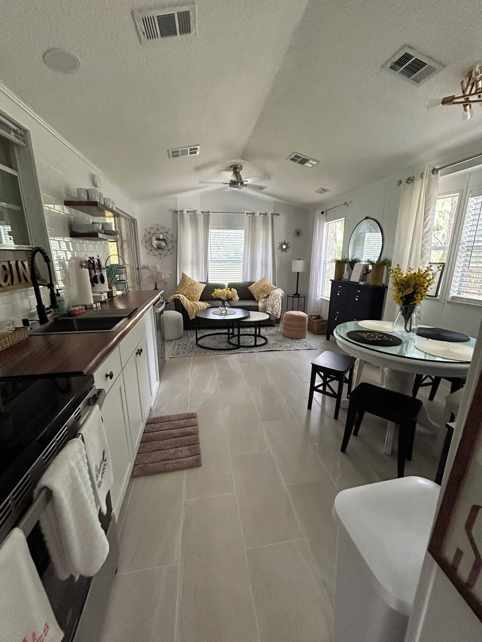 A beautiful kitchen and spacious area living room area, all in new renovated