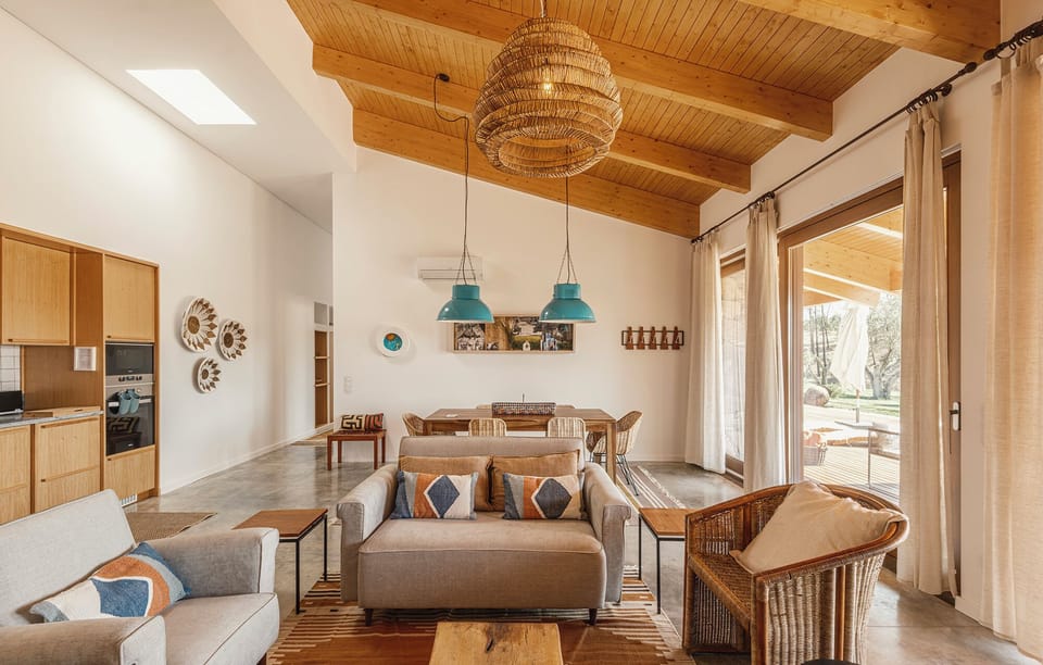 Deluxe Apartment, Pool View, Garden Area | Living area | Flat-screen TV