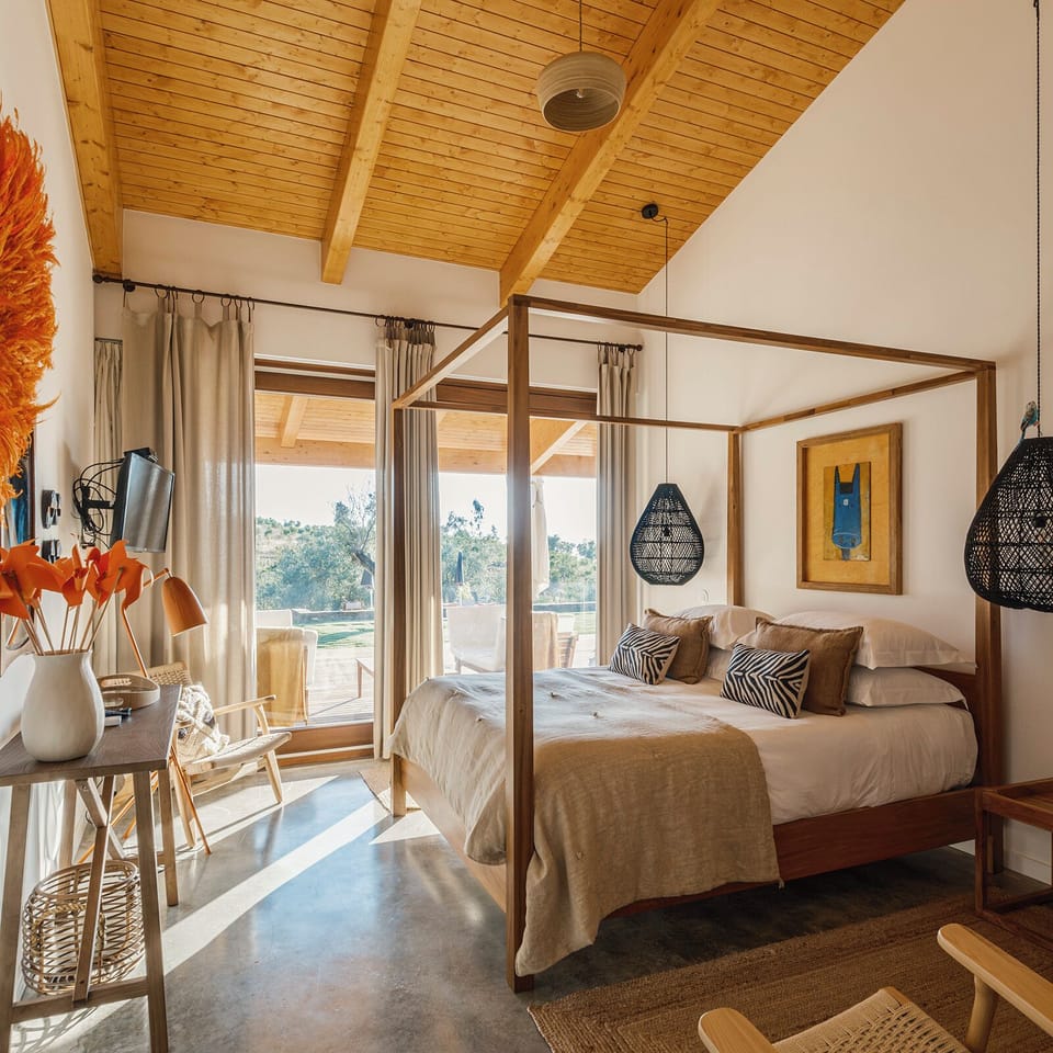 Deluxe Apartment, Pool View, Garden Area | Premium bedding, minibar, individually decorated, individually furnished