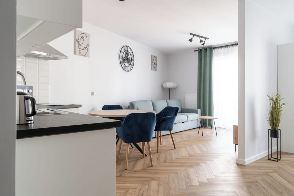 Apartment, 1 Bedroom, Balcony | Living room | Flat-screen TV