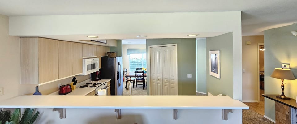 Beautiful breakfast bar that overlooks the kitchen and dining room!