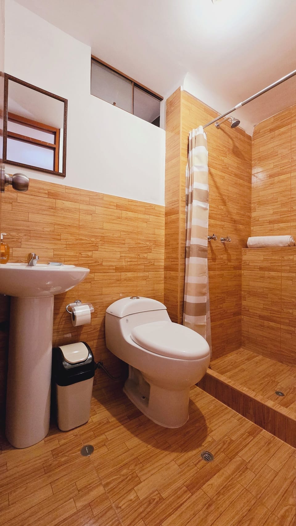 Shower, rainfall showerhead, hair dryer, towels