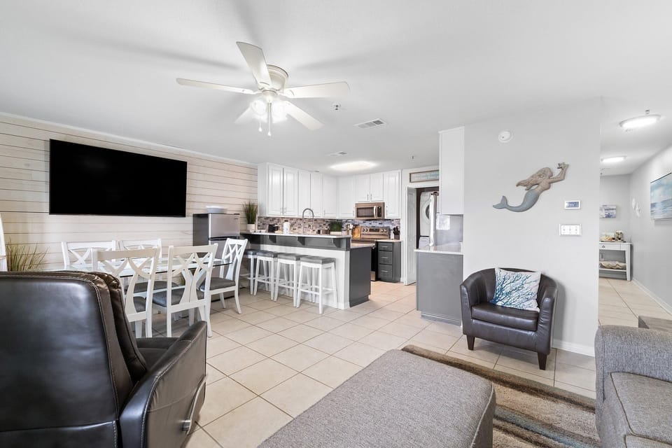 Condo, Multiple Beds (Grand Caribbean East 403) | Living area | TV