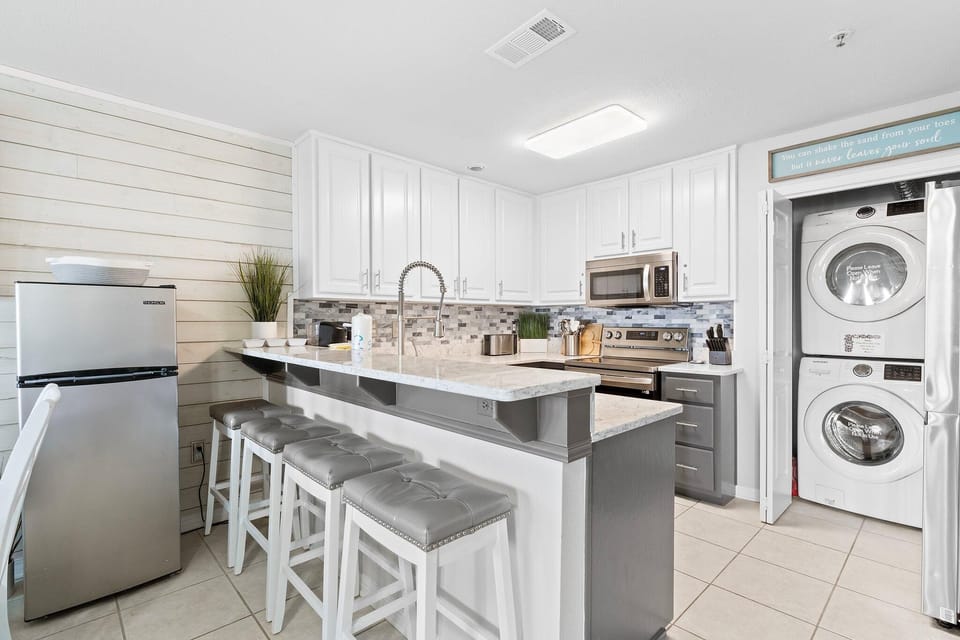 Condo, Multiple Beds (Grand Caribbean East 403) | Private kitchen | Oven, toaster, paper towels