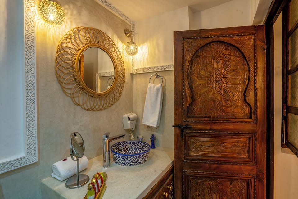 Shower, hair dryer, bathrobes, towels