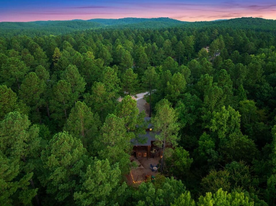 A sky-high perspective on your secluded cabin retreat.