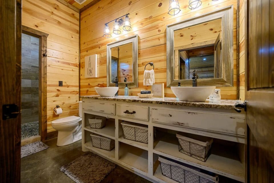 Unwind after a day of adventure in our stylish washroom, where every detail adds to your cabin retreat