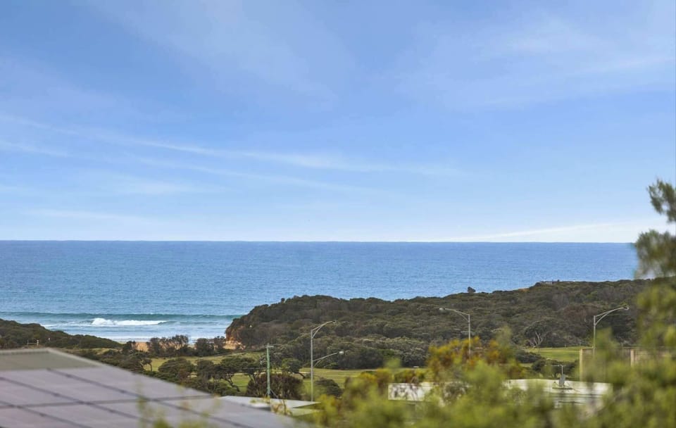 Watch the waves role in from the main living area  