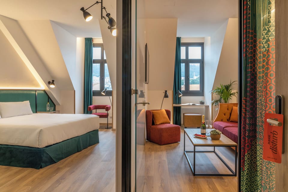Classic Suite, City View | Down comforters, minibar, in-room safe, desk