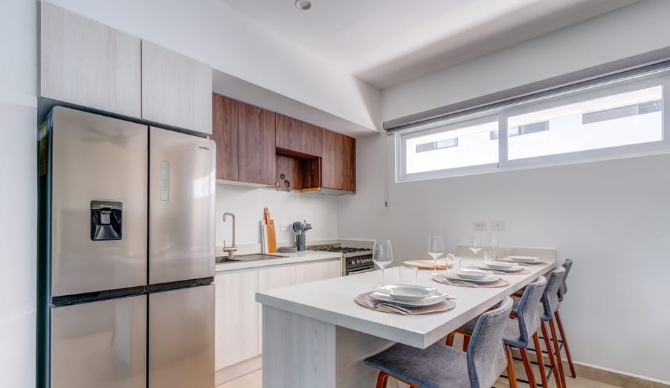 Cook up local treats in our modern kitchen with sleek appliances.