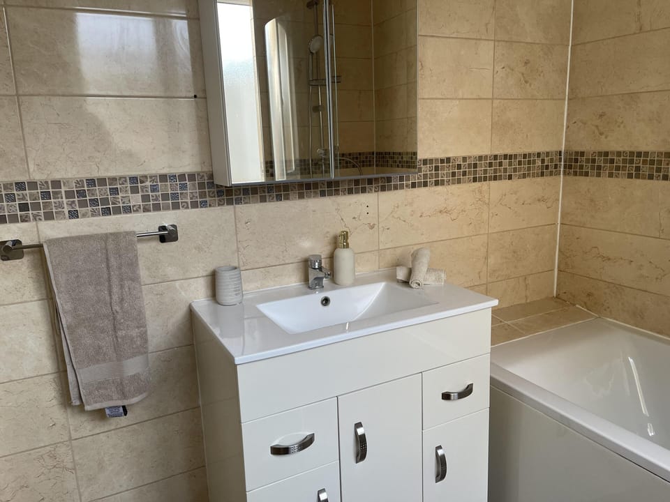 House | Bathroom | Combined shower/tub, deep soaking tub, towels