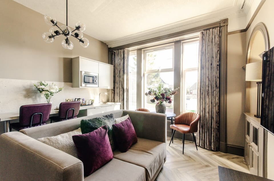 Deluxe Studio Suite, Non Smoking, Ground Floor | Living area | 50-inch Smart TV with digital channels