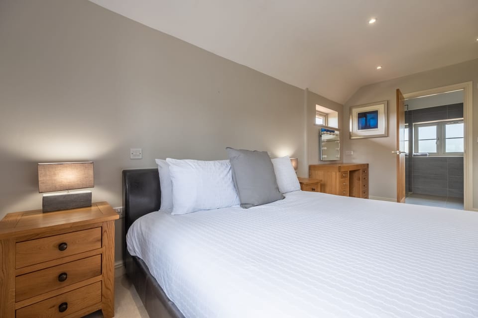 First floor: Bedroom two with king-size bed