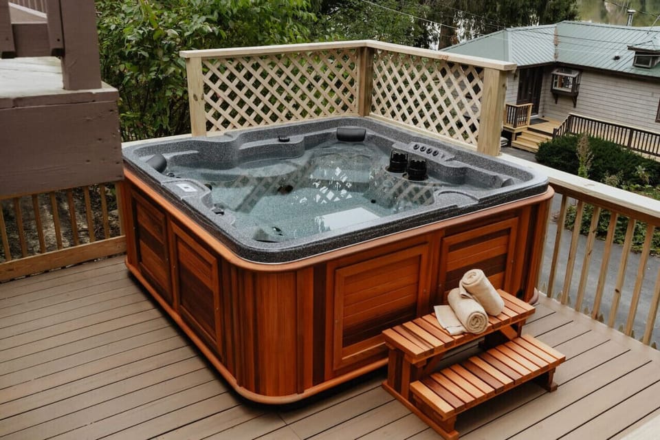 Soak in the serenity! Enjoy a relaxing evening in the hot tub with peaceful outdoor views.