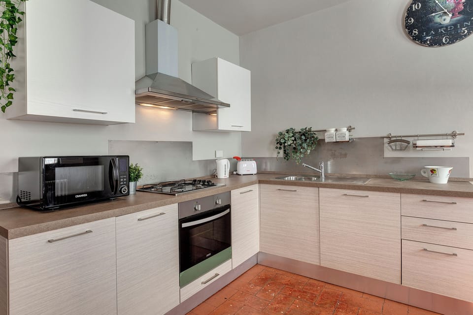 Apartment | Private kitchenette | Full-size fridge, microwave, oven, dishwasher