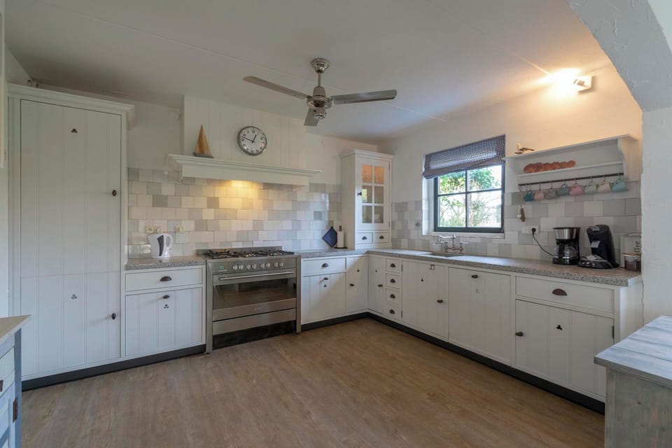 Villa | Private kitchen | Electric kettle, toaster, highchair