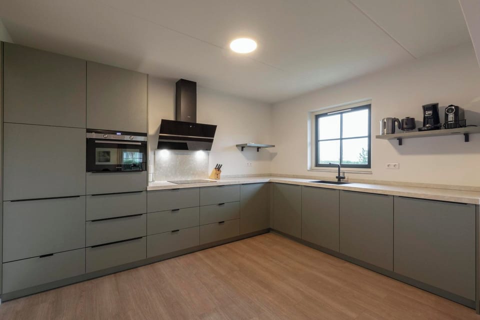Villa | Private kitchen | Stovetop, electric kettle, toaster, highchair