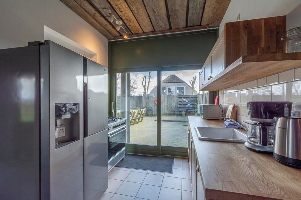 Villa | Private kitchen | Stovetop, highchair