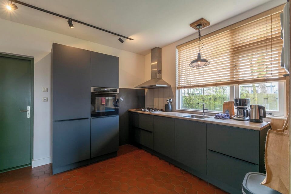 Villa | Private kitchen | Stovetop, highchair