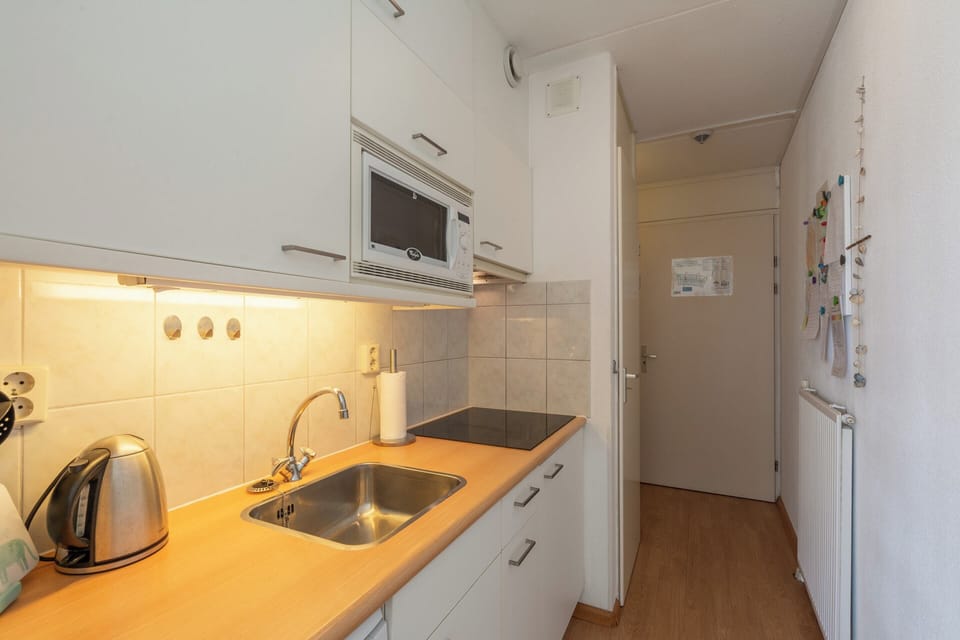 Apartment | Private kitchen | Electric kettle, toaster, highchair