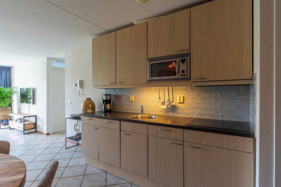 Apartment | Private kitchen | Electric kettle, toaster, highchair