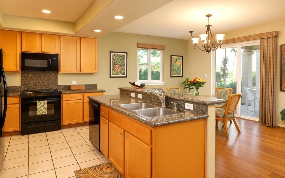 Bright, open kitchen with bar seating and all the essentials for a gourmet meal    