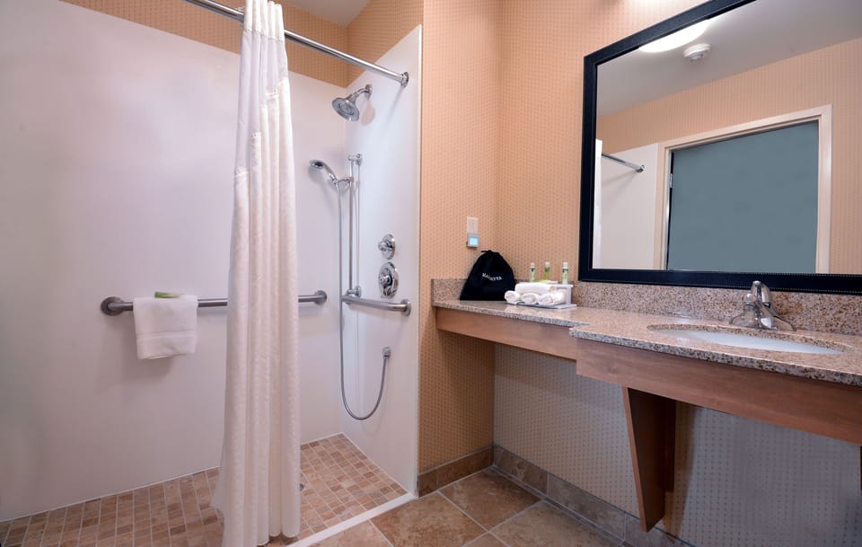 Suite, 2 Queen Beds, Roll-in Shower (Mobility Accessible) | Bathroom | Combined shower/tub, spring water tub, hydromassage showerhead