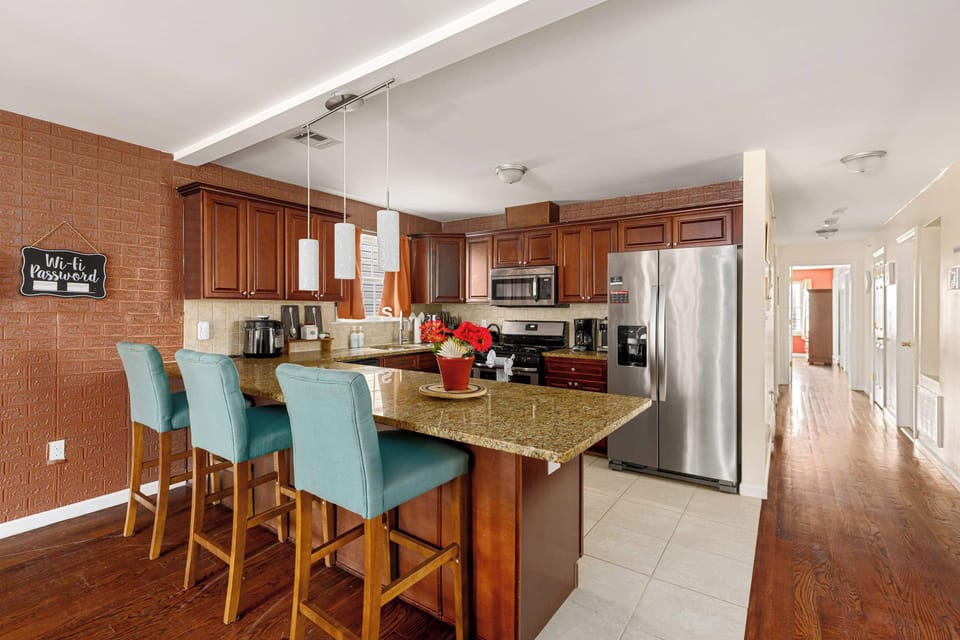 Level 2 Kitchen + Hallway leading to bedrooms and bathrooms