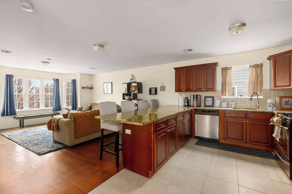 Newark Pearl Level 3 Living / Dining Area with tons of natural light (pots, pans,  cooking utensils, condiments, spices, baking sheets, coffee, espresso machine, dish/silverware, and more provided)