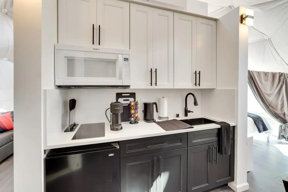 Mini-fridge, microwave, stovetop, coffee/tea maker