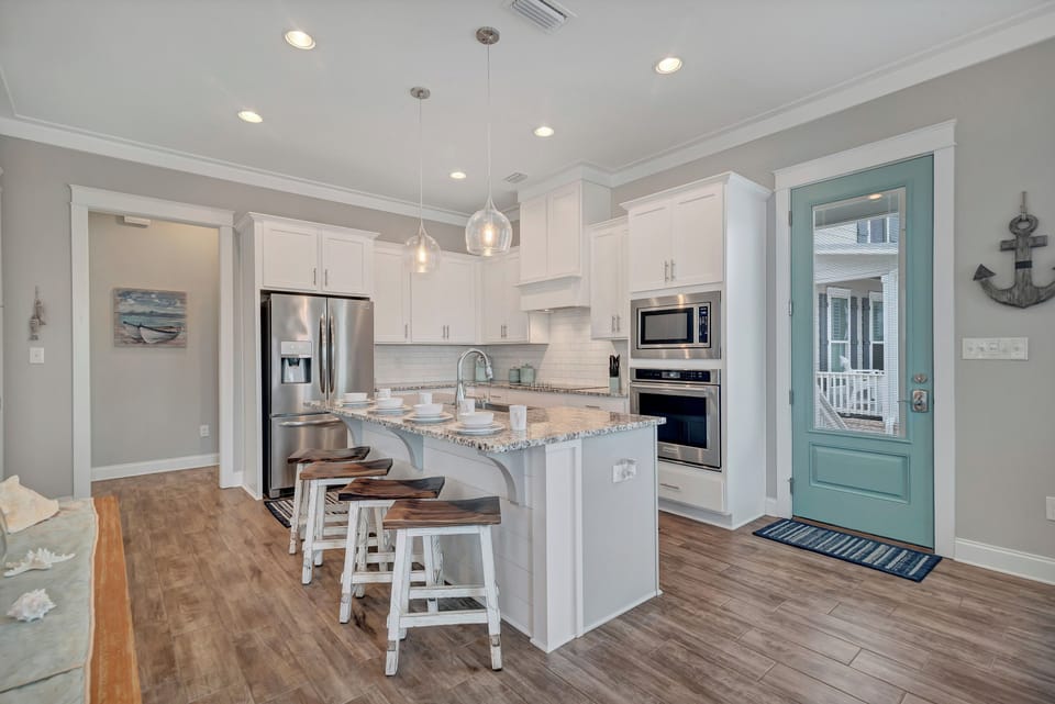 Enjoy breakfast at the oversized kitchen island before hitting the beach!!