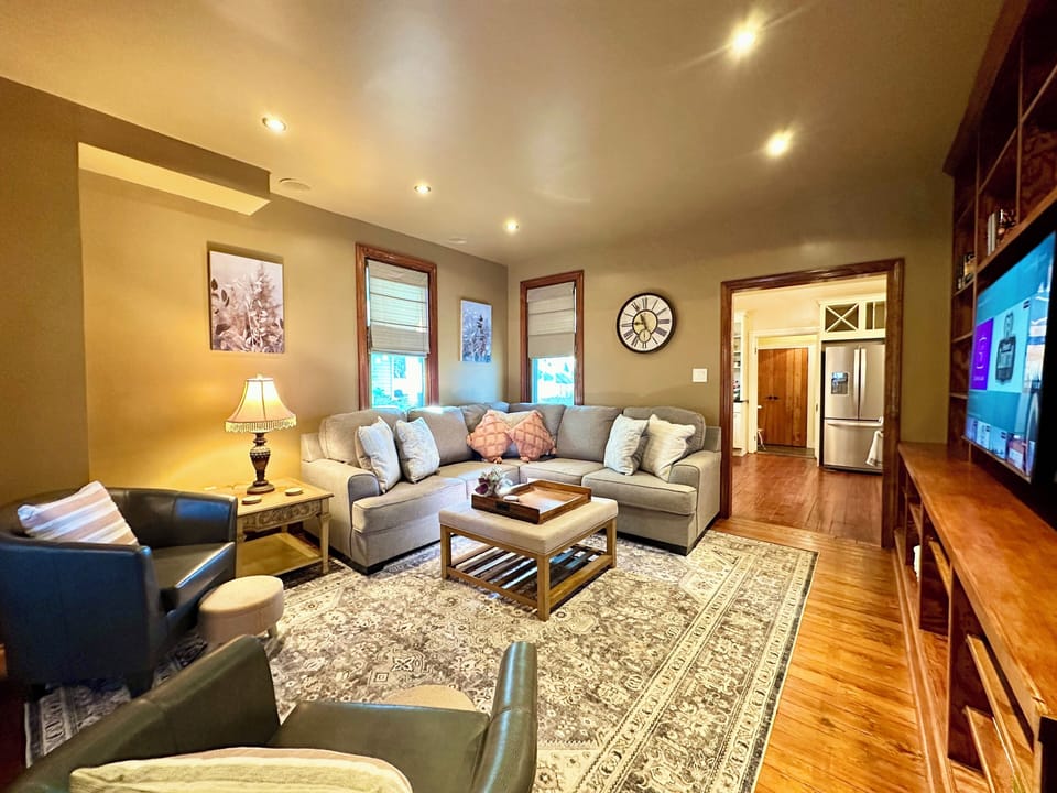 Formal Living Room w/ Sectional & Accent Seating + 65" Smart TV