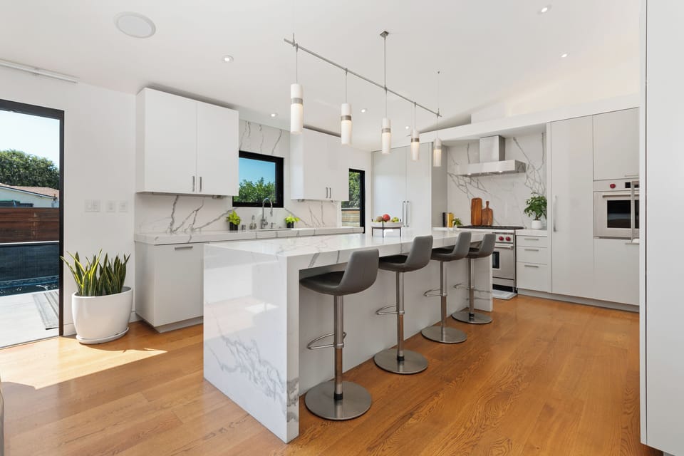 Stylish bar chairs and table in the kitchen for casual dining and gatherings.