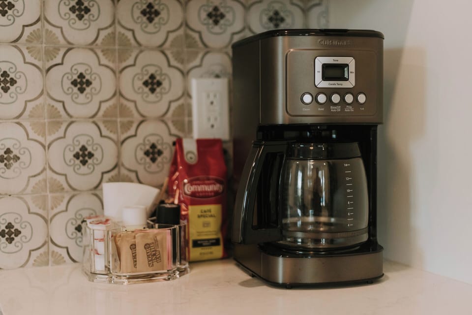 Full-size coffee maker with complimentary coffee. 