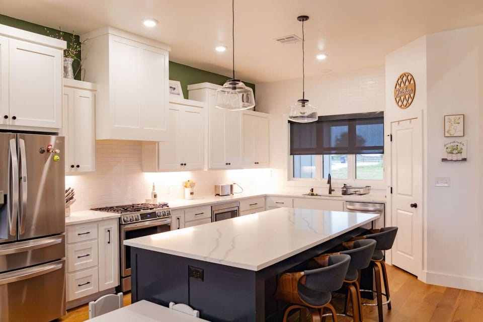 3 more stools available at the kitchen island.